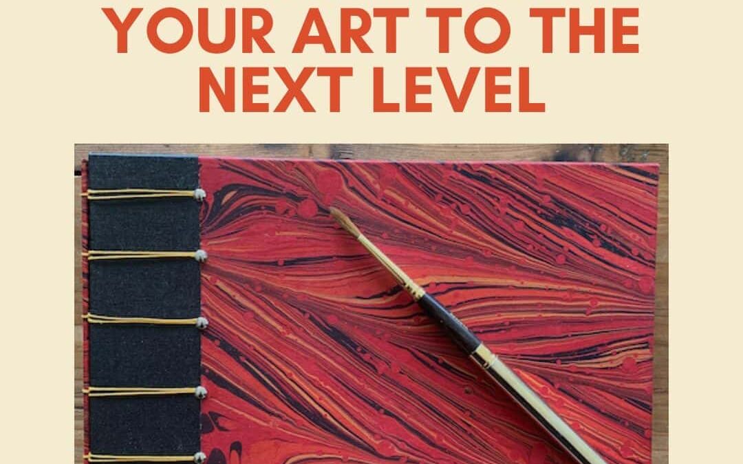 Seven Steps - red sketchbook with paintbrush
