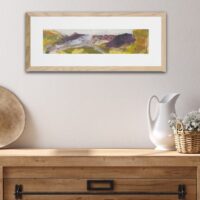 Home decor - an abstract landscape above a wooden chest.