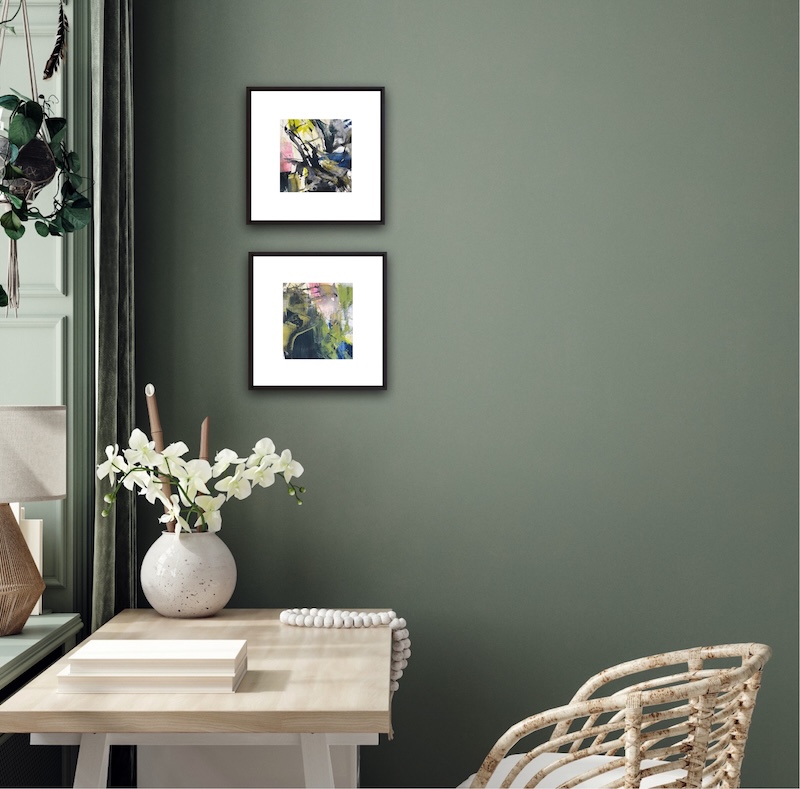 VMW00286 on green wall Two small abstract paintings on a green wall