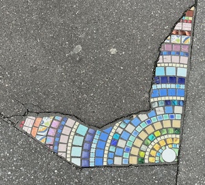 Paris pavement repair one of the Art Delights of Paris